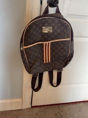 Louis Vuitton Brown Monogram Backpack with Tan Trim